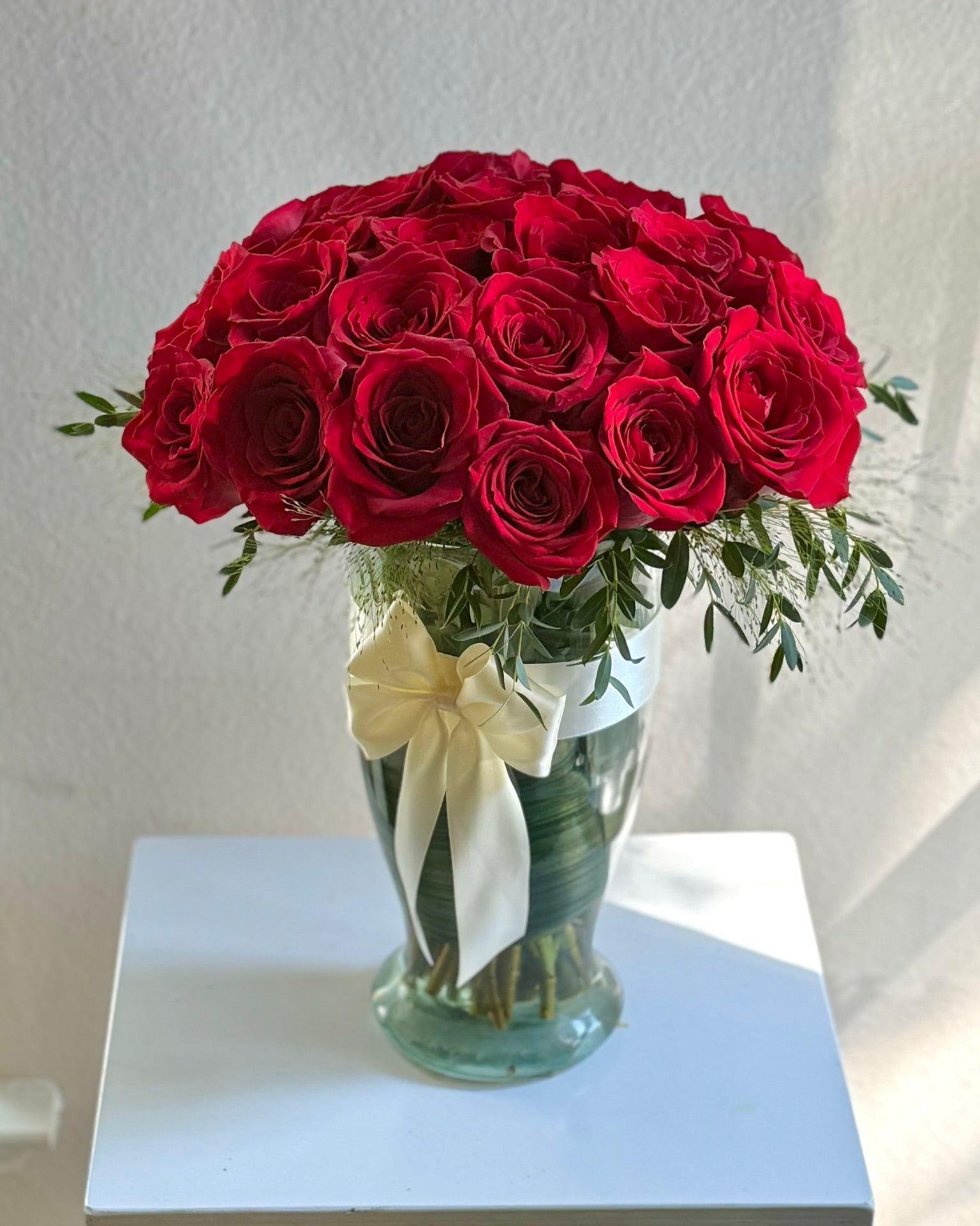 Red Roses in a Glass Vase